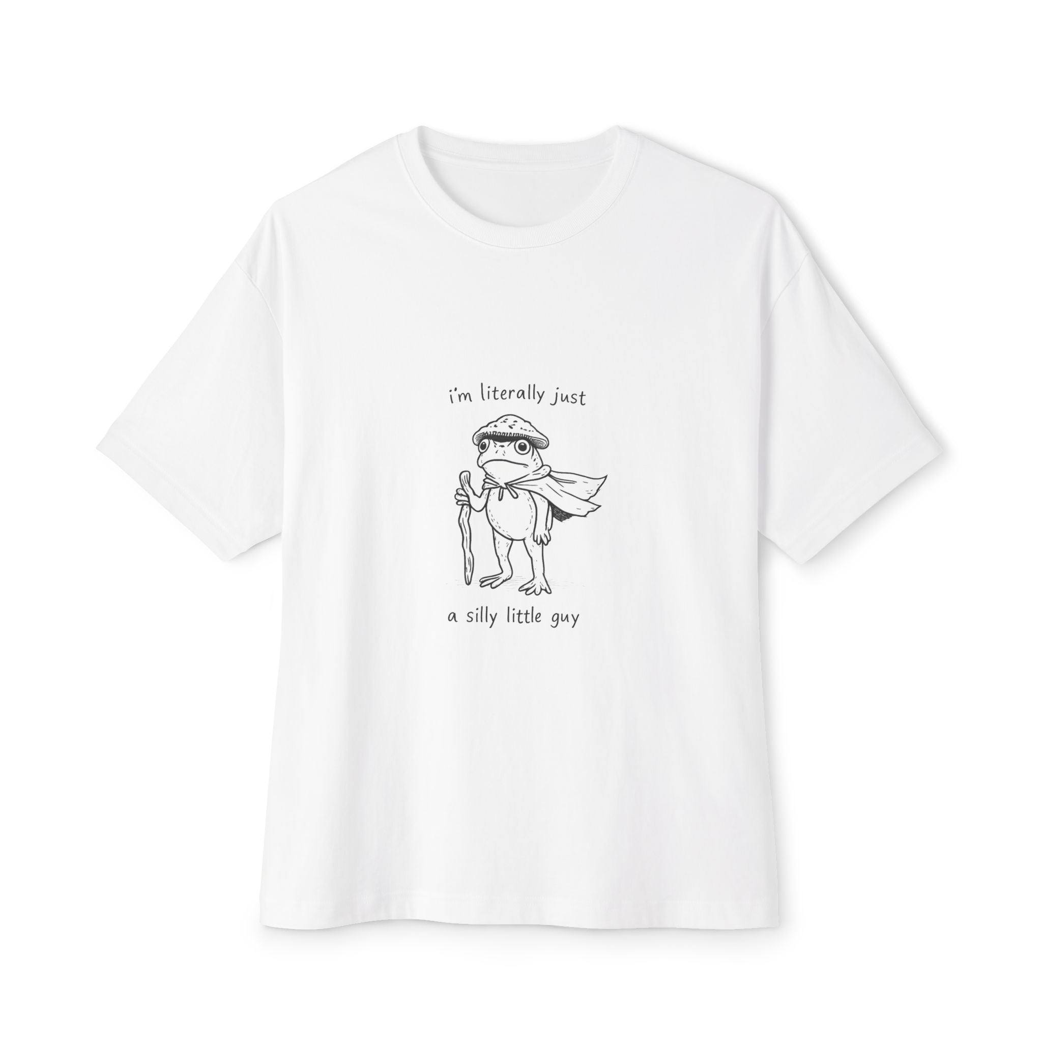 a silly little frog guy on an oversized t-shirt
